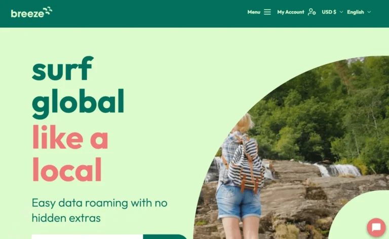 A traveler using Breeze eSIM on their smartphone while exploring a scenic destination.